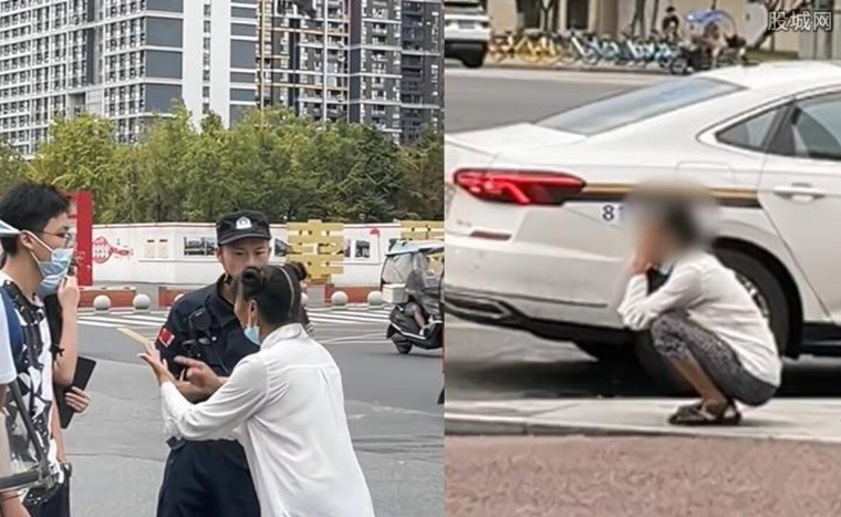 大妈蹲在路边大哭